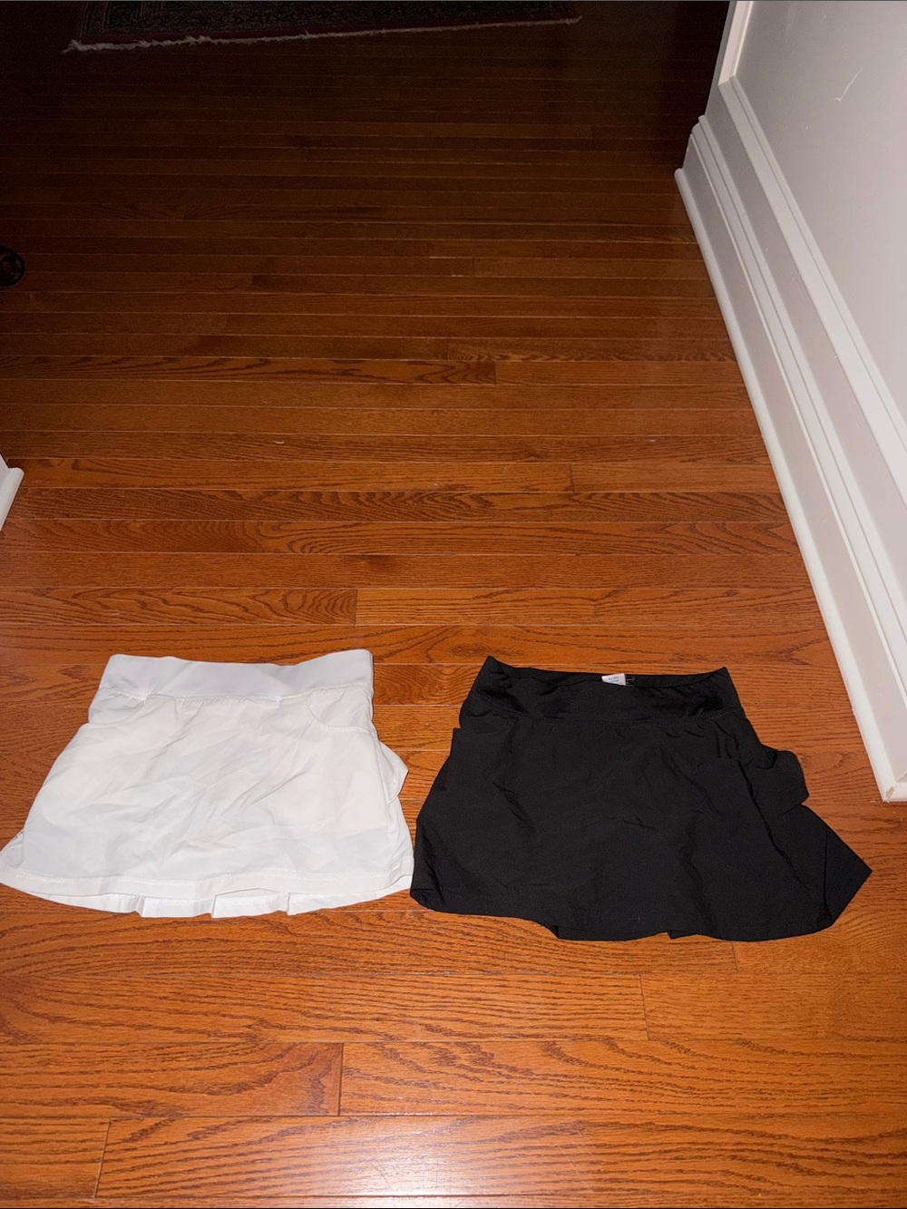 White and Black Pleated Athletic Skorts - Pair